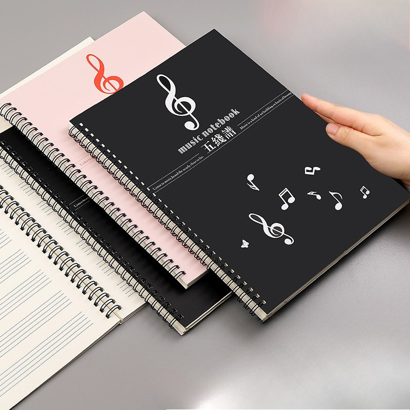 Blank Sheet Music Notebook - دفتر ملاحظات موسيقي حلزوني فارغ بخطوط